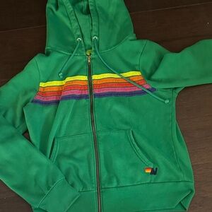 Vibrant Green Hoodie with Rainbow Stripes